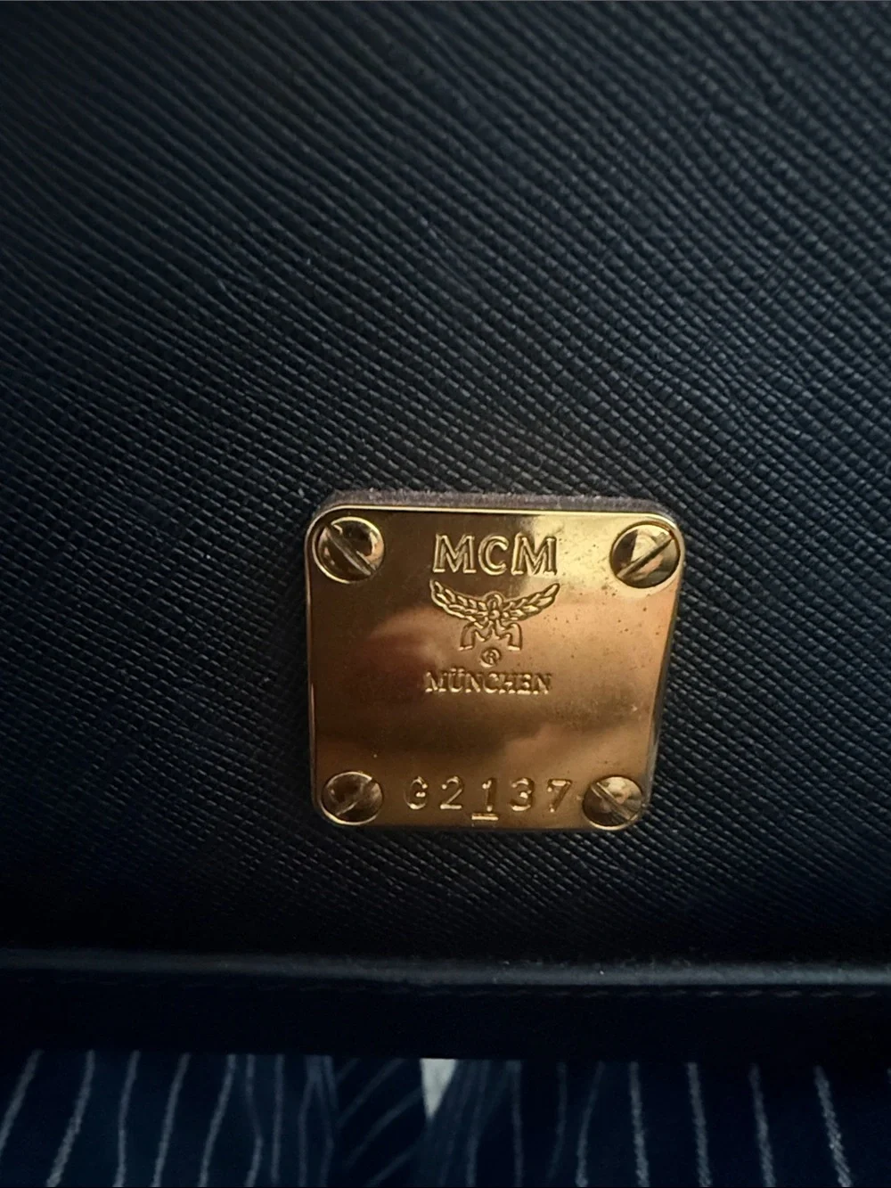 MCM Black Leather Shoulder Bag with Gold Logo Plate